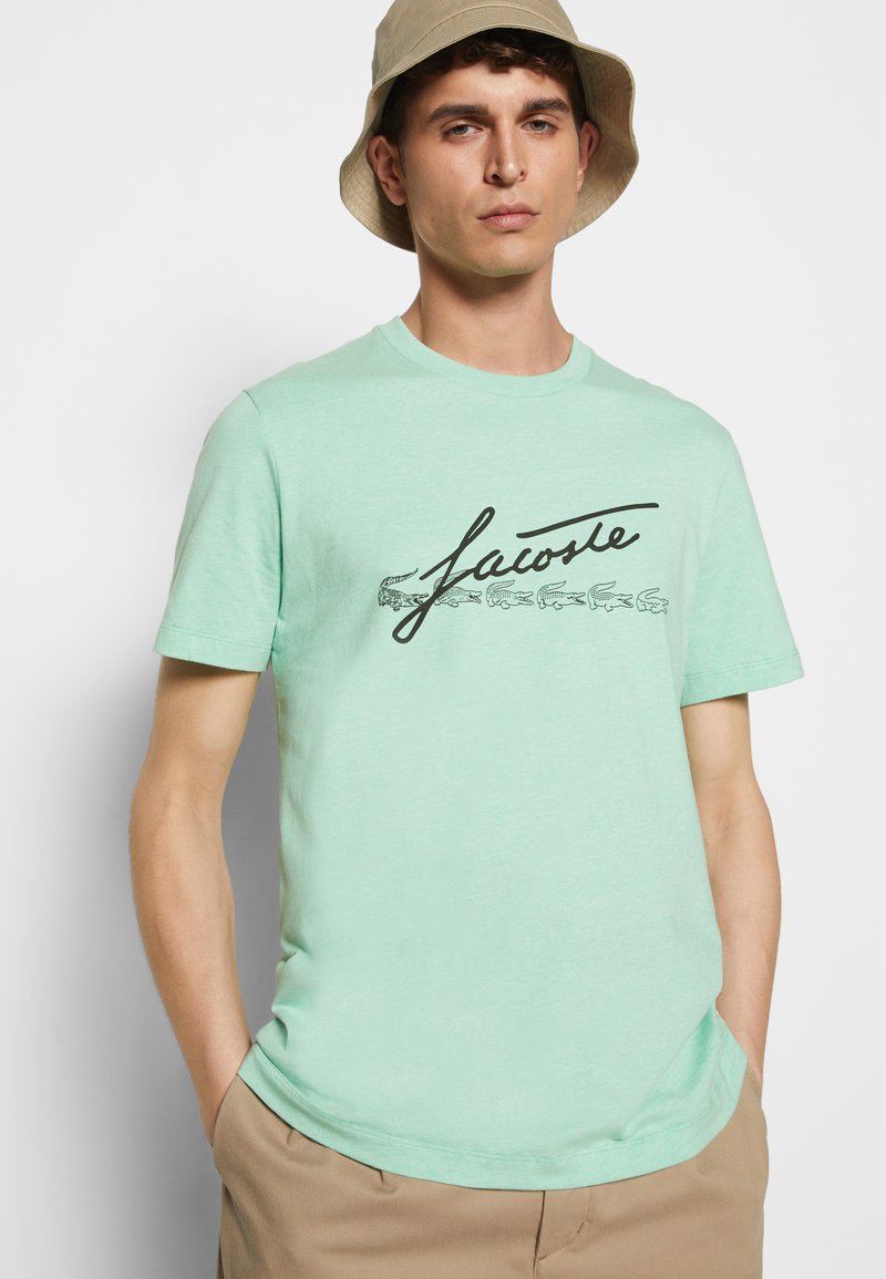 Herren T-Shirts basic | Lacoste T-Shirt print vert/hellgrün - SR04200 Herren T-Shirts basic | Lacoste T-Shirt print vert/hellgrün - SR04200