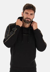 LIFESTYLE TEXTILIEN ATHLETICA CLASSIC  - Sweat à capuche - schwarz
