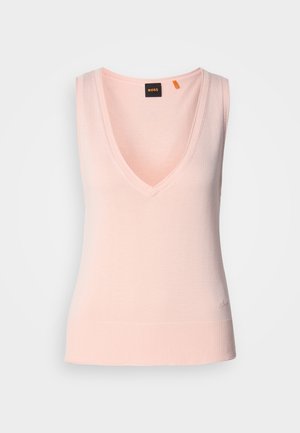Light pink sleeveless sweater with a deep V-neck, ribbed hem, smooth texture, and embroidered logo on the lower left side.