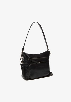 Sac en cuir noir porté en travers avec une bandoulière réglable, poches zippées, texture lisse et accents métalliques contrastants.