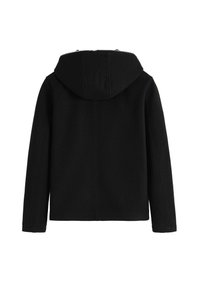 Manteau noir à capuche avec une texture lisse, présentant une coupe droite et des détails de couture à l'arrière. Design simple et fonctionnel.
