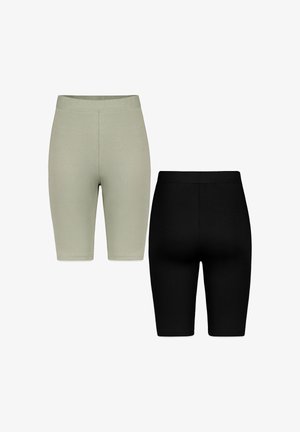 Zwei Paar gerippte Strick-Biker-Shorts, ein hellgraues Paar von vorne und ein schwarzes Paar von hinten, auf weißem Hintergrund gezeigt.