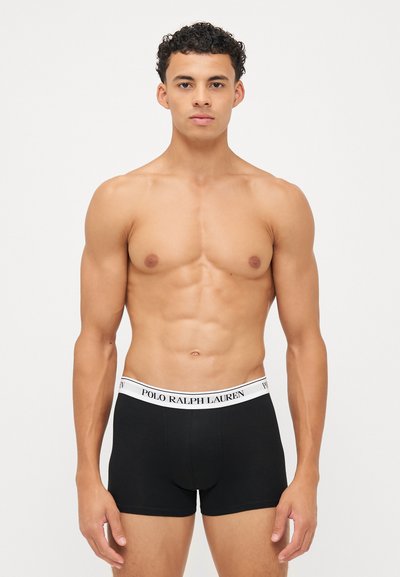 Boxeri negri din bumbac cu un elastic alb la talie, având logo-ul "POLO RALPH LAUREN", cu un design ajustat.