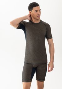 Athletic two-piece outfit in dark gray with blue accents. Shirt features short sleeves and a round neckline; shorts have a fitted design.