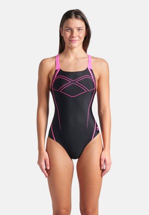 Costume da bagno nero con dettagli rosa, caratterizzato da un design incrociato sul davanti e spalline sottili. Realizzato in materiale liscio ed elasticizzato.