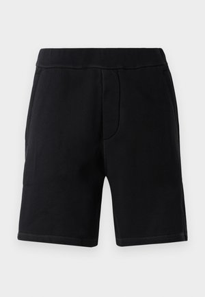 Sorte treningsshorts laget av mykt materiale; har en elastisk midje, to sidelommer og kontraststing.