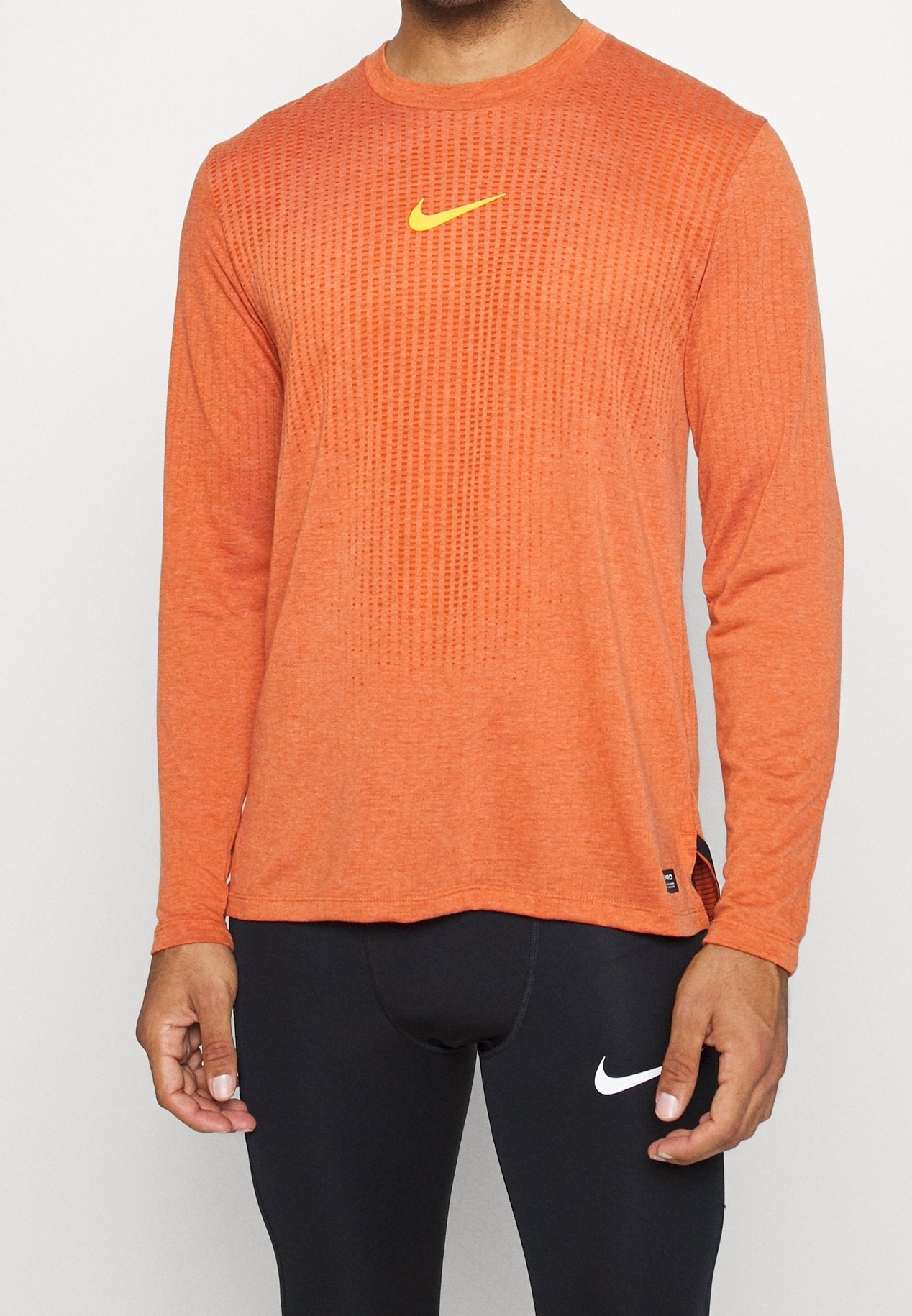 orange nike long sleeve shirt