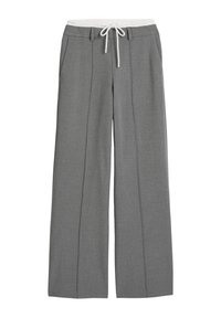 Szare spodnie o szerokich nogawkach z teksturowanym wykończeniem, elastycznym paskiem w talii i sznurkiem do regulacji. Posiadają dwie boczne kieszenie oraz detale w postaci cienkich prążków.