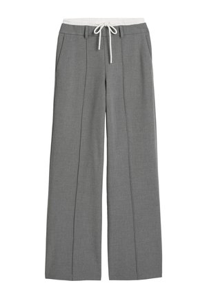 Grijze broek met wijde pijpen, een gestructureerde afwerking, een elastische tailleband en een trekkoord. Voorzien van twee zijzakken en krijtstreepdetails.