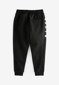 Next Verryttelyhousut - black