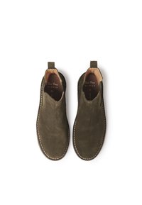Olive green suede ankle boots with a smooth finish, elastic side panels, back pull tabs, and white stitching details along the sole. Size 37.
