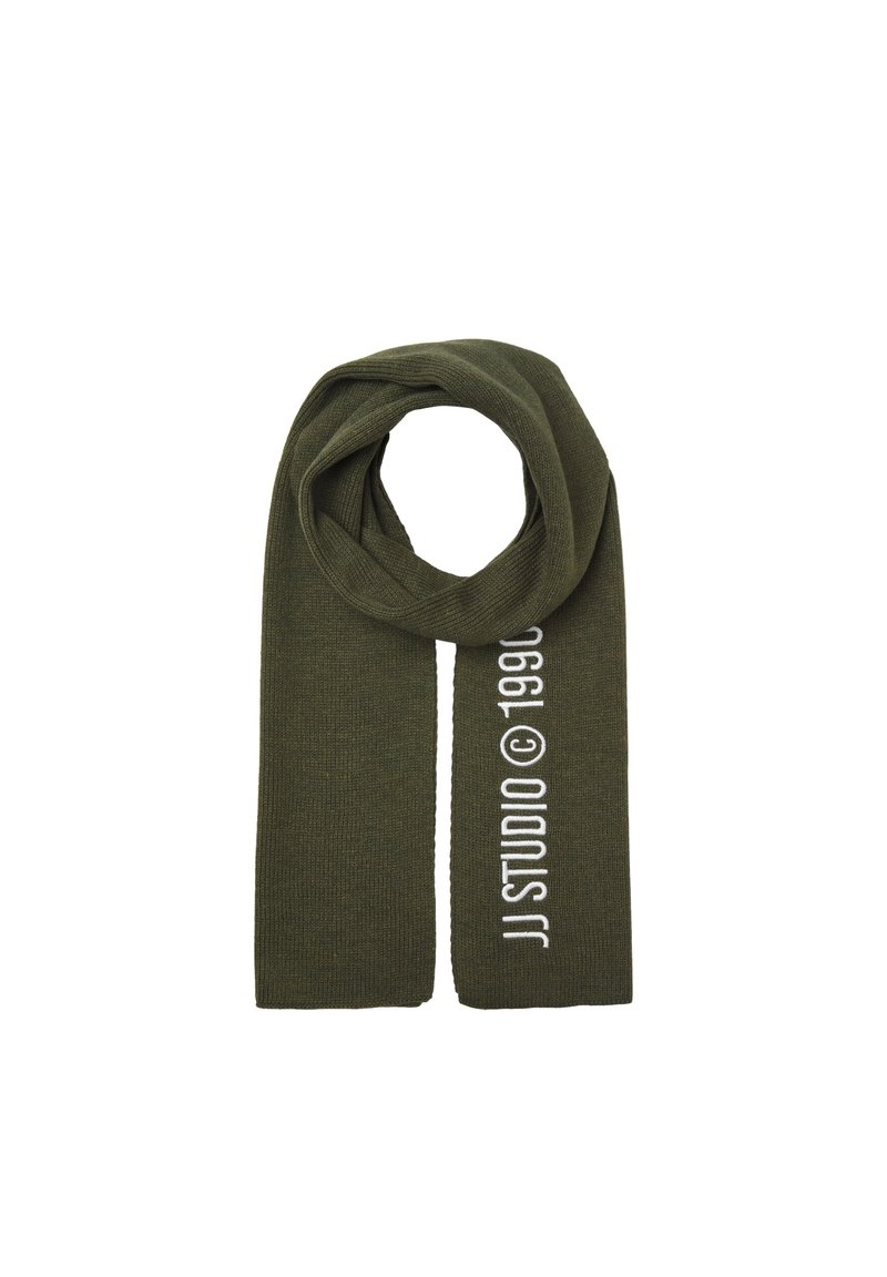 Olive green knit scarf with ribbed texture, featuring white text "JJ STUDIO © 1990" along one edge. Designed for warmth and comfort.