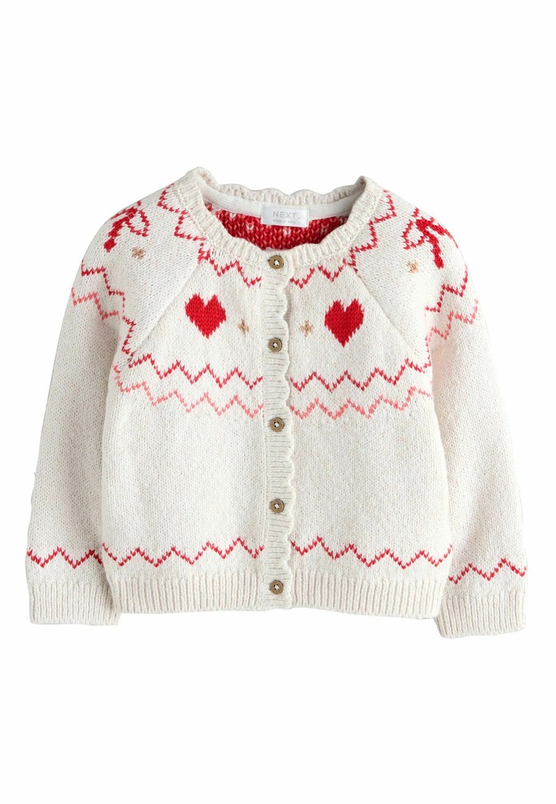 Textured cream cardigan with red and light pink hearts, zigzag patterns, and decorative buttons. Features a round neckline and ribbed cuffs.