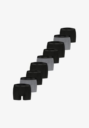 Schwarze und graue Boxershorts mit einem elastischen Bund, auf dem das "PUMA"-Logo zu sehen ist. In einer Reihe angeordnet, mit wechselnden dunklen und hellen Farbtönen.