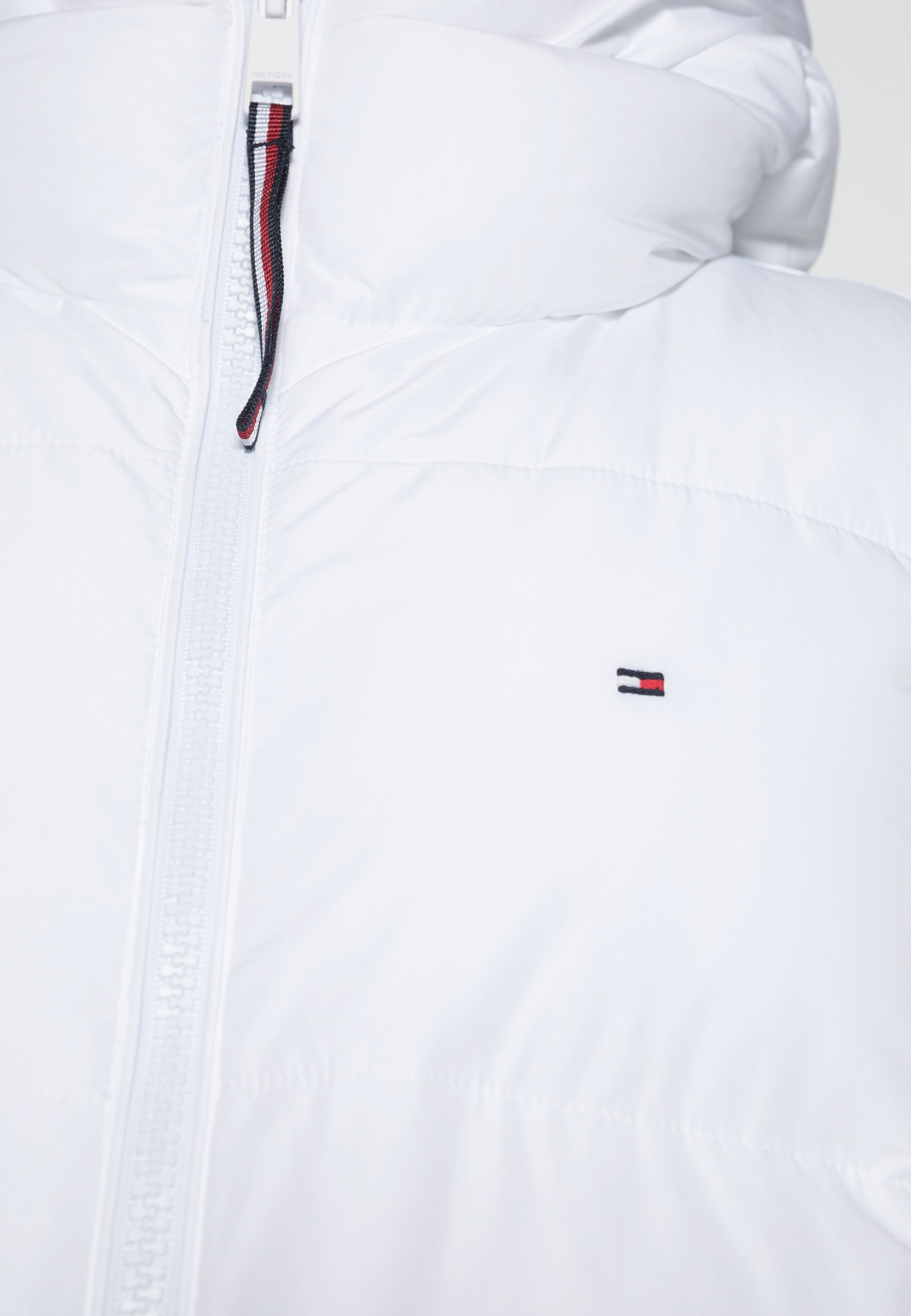 white tommy jacket