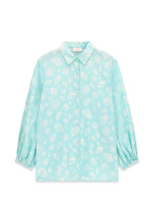 Chemise bleu clair à manches longues boutonnée, avec motif de coquillages blancs et poignets, col et boutons avant élastiques.