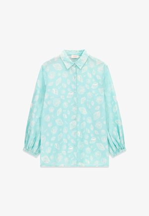Camicia azzurro chiaro a maniche lunghe con bottoni, motivo conchiglie bianche ed elastici su polsini, colletto e bottoni frontali.