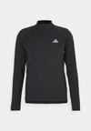 GYM TRAINING ZIP LONG SLEEVE - Camiseta de manga larga - black