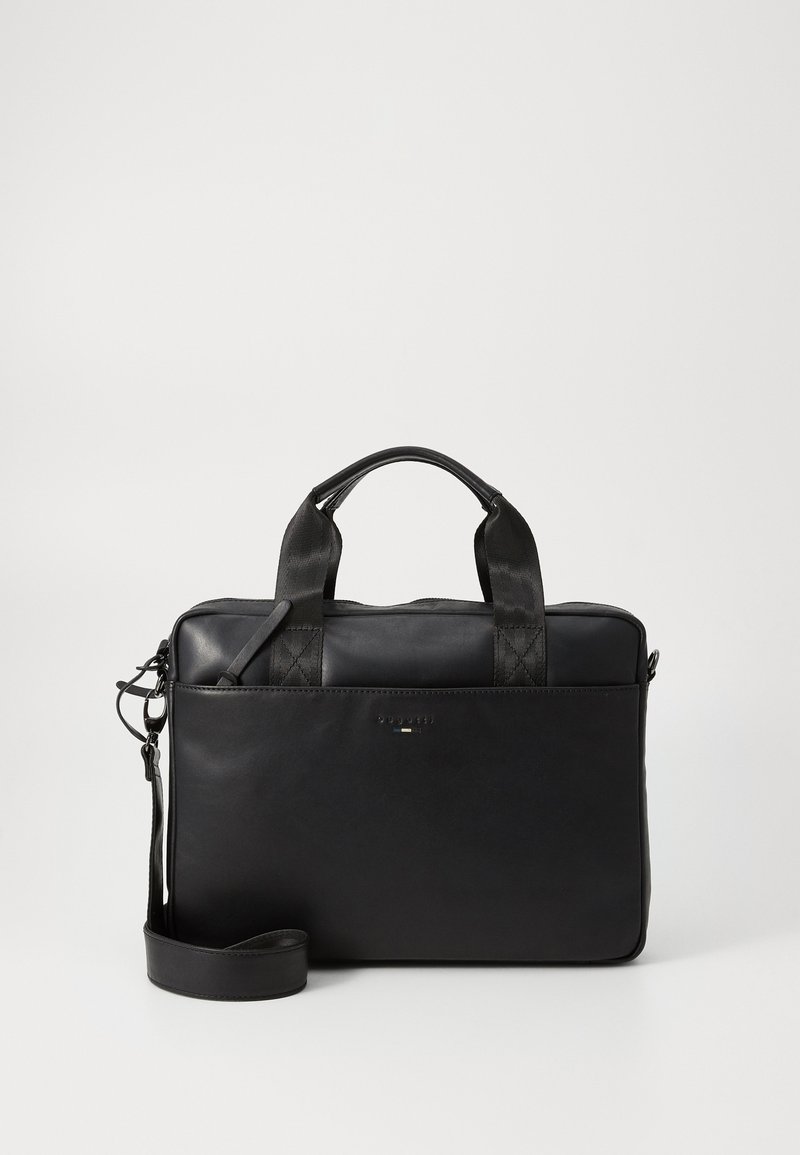 Svart lær laptopveske med to topphåndtak og avtagbar skulderreim. Har stikninger som detaljer og et logomerke på forsiden.