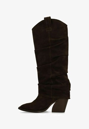 Dark brown suede mid-calf slouchy boot with pointed toe and angled block heel.