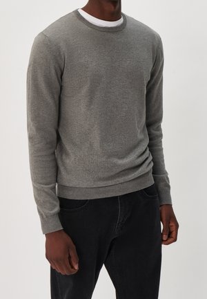 Stickad tröja - grey