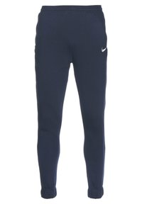 Marineblauwe sweatpants van zacht stof, met een taps toelopend ontwerp en elastische boorden, voorzien van een klein zilveren Nike-logo op de linker dij.