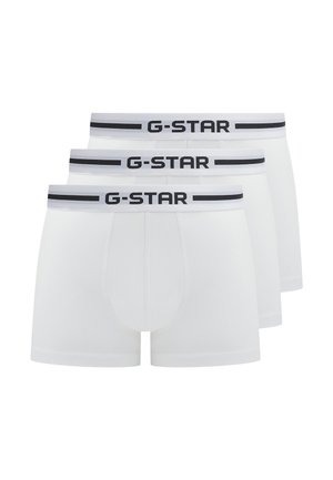 Tre boxer bianchi da uomo con fasce elastiche bianche e nere con il nome del marchio G-STAR.