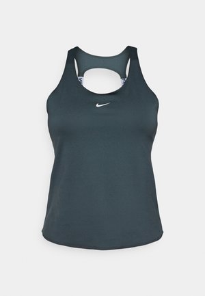 Ciemnozielony sportowy top bez rękawów z okrągłym dekoltem i wycięciem na plecach. Posiada małe białe logo Nike z przodu. Wykonany z gładkiego, oddychającego materiału.