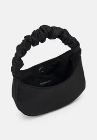 Black fabric handbag with a gathered, soft handle. The interior features a visible logo label and a snap closure. Smooth texture.