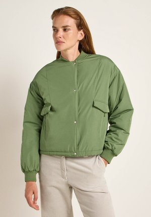 Green bomber jacket with a ribbed collar, snap closures, and front patch pockets. Made from smooth, lightweight fabric. Cropped design.
