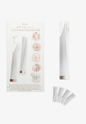 Sonic dermaplaner z białym plastikowym korpusem, teksturą w żeberka i złotym akcentem. Zawiera cztery wymienne precyzyjne ostrza oraz opakowanie z ilustracjami.