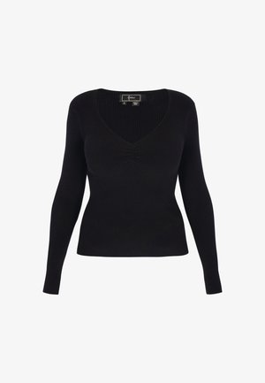 Mustassa ribbattu pitkähihaisen neuleen V-pääntie ja rypytys yksityiskohta rinnassa, valmistettu pehmeästä kankaasta, istuva muotoilu, sileä tekstuuri.