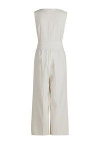 Jumpsuit crema con gambe ampie, design senza maniche e una zip sul retro. Presenta una vita sfiancata e un tessuto morbido e liscio.
