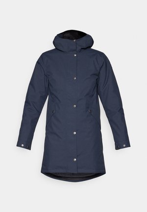 Parka impermeable de color azul marino con capucha, botones a presión, bolsillos laterales y un dorso ligeramente alargado para mayor cobertura.