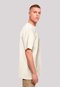 F4NT4STIC HELLO HEIDI - Print T-shirt - sand