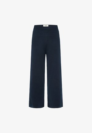 Weite Hose in Marineblau, aus einem weichen Stoff gefertigt. Verfügt über einen glatten Taillenbund und einen klaren, minimalistischen Schnitt ohne sichtbare Verschlüsse.