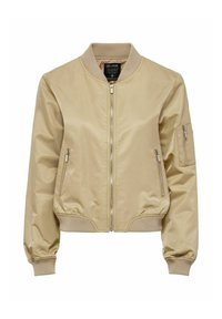 Chaqueta bomber beige de material suave y brillante. Presenta puños y cuello de canalé, dos bolsillos frontales con cremallera y un bolsillo en la manga.