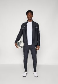 Under Armour PRO PANT - Donji dijelovi trenirke - black/white