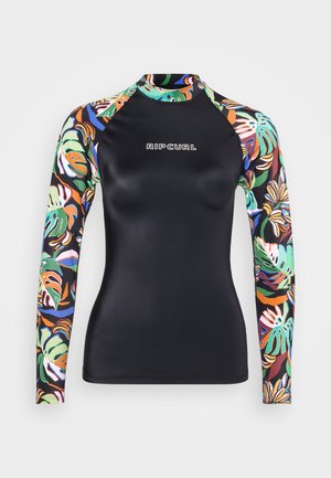 Langarm-Rashguard in Schwarz mit bunten tropischen Blattmustern an den Ärmeln, schlankem Design und RIP CURL-Logo auf der Vorderseite.