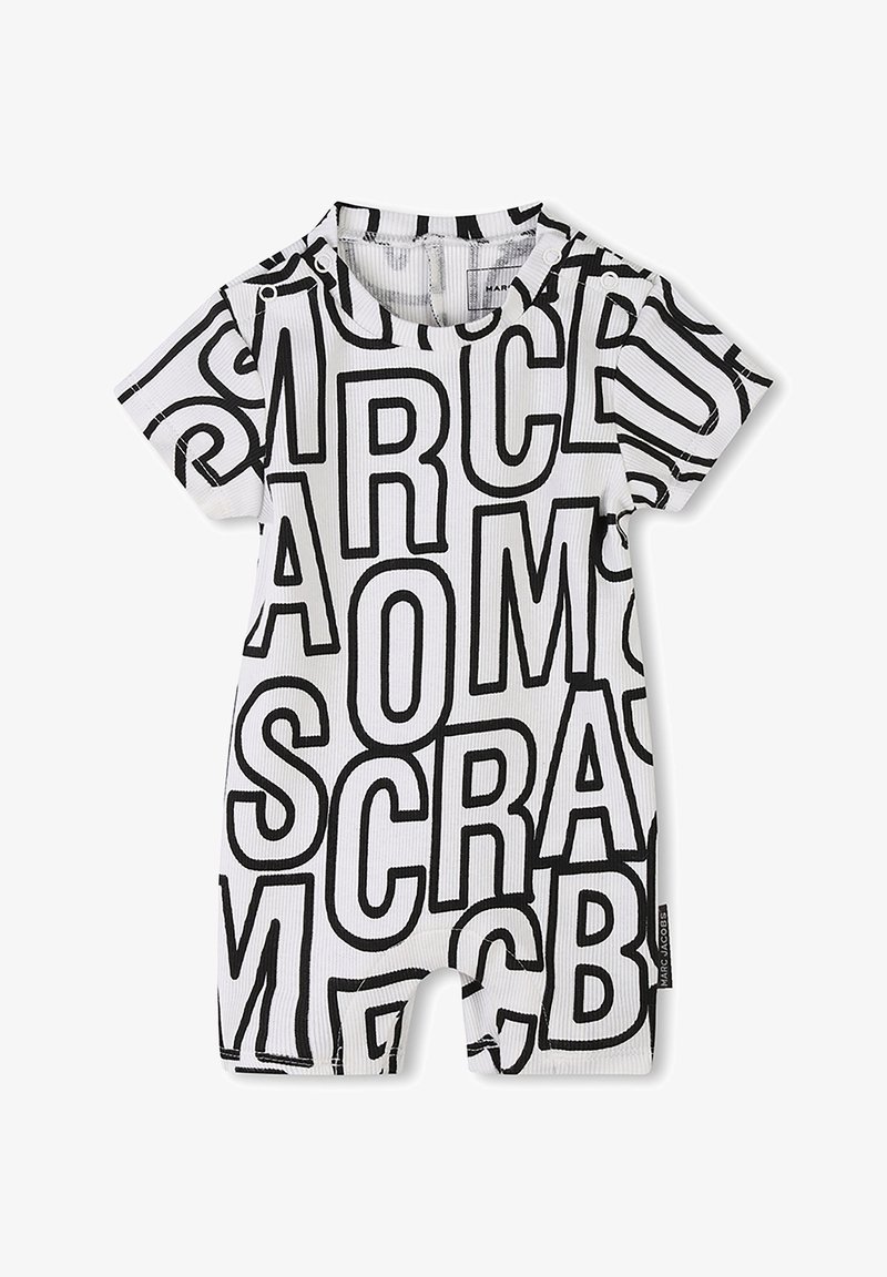 Rompers à manches courtes en tissu ribdé, avec de grandes lettres noires sur fond blanc. Fermetures à pression aux épaules pour un habillage facile.