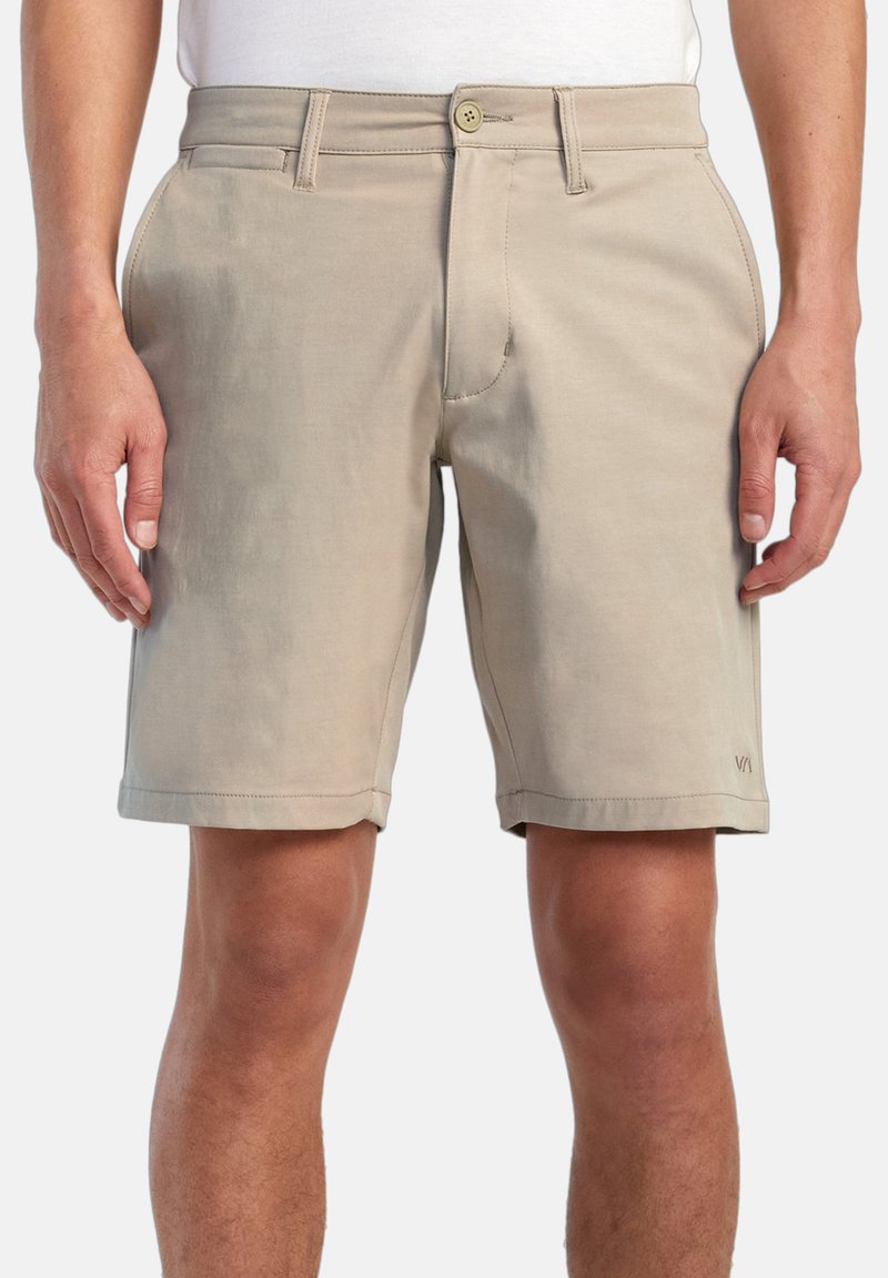 Beige shorts made of lightweight fabric. Classic design with a button closure, belt loops, and side pockets. Clean hem.