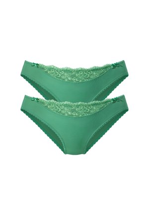 Two green women's panties with lace trim and small bows on the waistband, displayed on a white background.