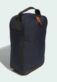 Marineblauwe tas gemaakt van textuurstof met een zwarte rits en een oranje trekhaak; heeft een stevige zwarte handvat aan de bovenkant.