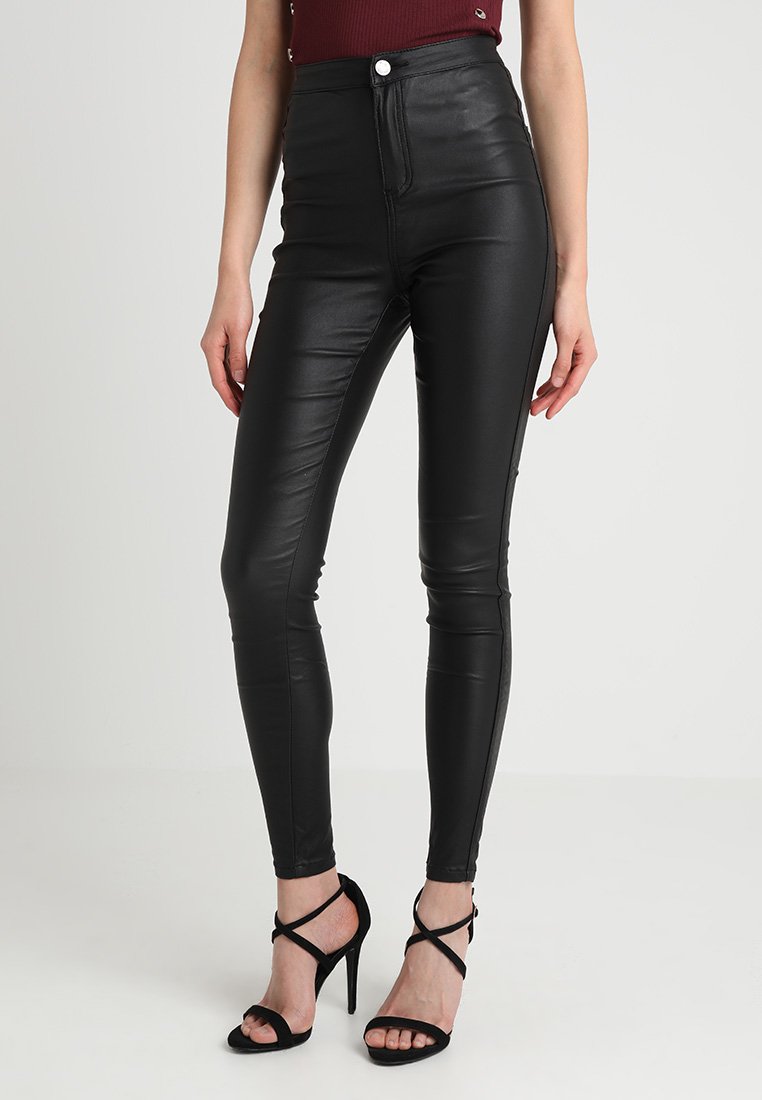 coated black trousers
