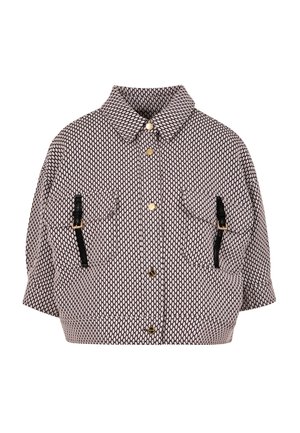 Lühike mustriga jakk teemantkujudega, ees suruaugud, kaks rinnataskut ja mustade rihmade aksendid iga tasku peal.