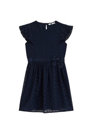Granatowa sukienka bez rękawów z teksturowanymi groszkami, plisowanymi falbanami na rękawach, marszczonym dołem oraz satynową kokardą w talii.