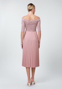 Dusty pink dress featuring a lace bodice with three-quarter sleeves and a pleated skirt. Off-the-shoulder neckline and smooth fabric texture.