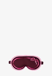 Silke sovemaske i dyp burgunder med rosa båndkant og en sløyfeakcent. Den har en glatt tekstur og elastisk stropp for en sikker passform.