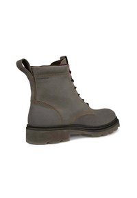 Gray waterproof ankle boot with a textured upper, round toe, lace-up design, and rugged sole. Features a pull tab for easy wear.