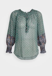 Blouse verte à motifs avec col froncé et manches longues bouffantes. Accents bleus à motifs aux extrémités des manches. Tissu léger et transparent.